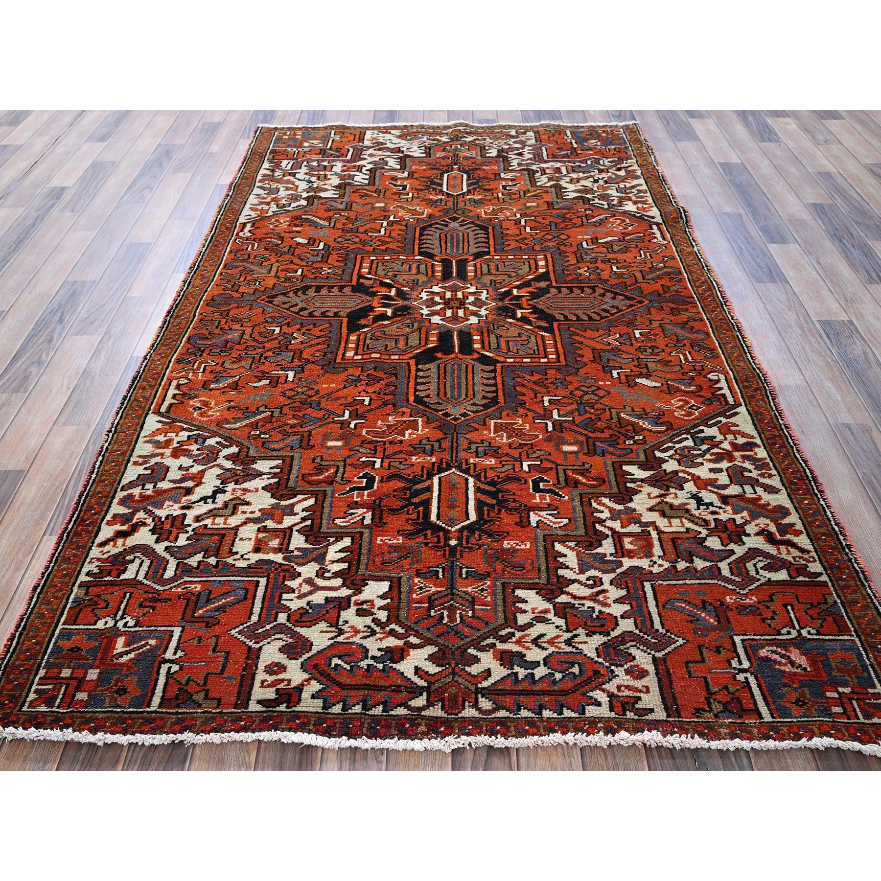 4'9"x8'1" Vivid Orange, Vintage Persian Heriz with Geometric Medallion Design, Animal Figurines, Pure Wool, Hand Knotted, Even Wear, Sheared Low, Good Condition, Sides and Ends Professionally Secured, Oriental Rug Sh294