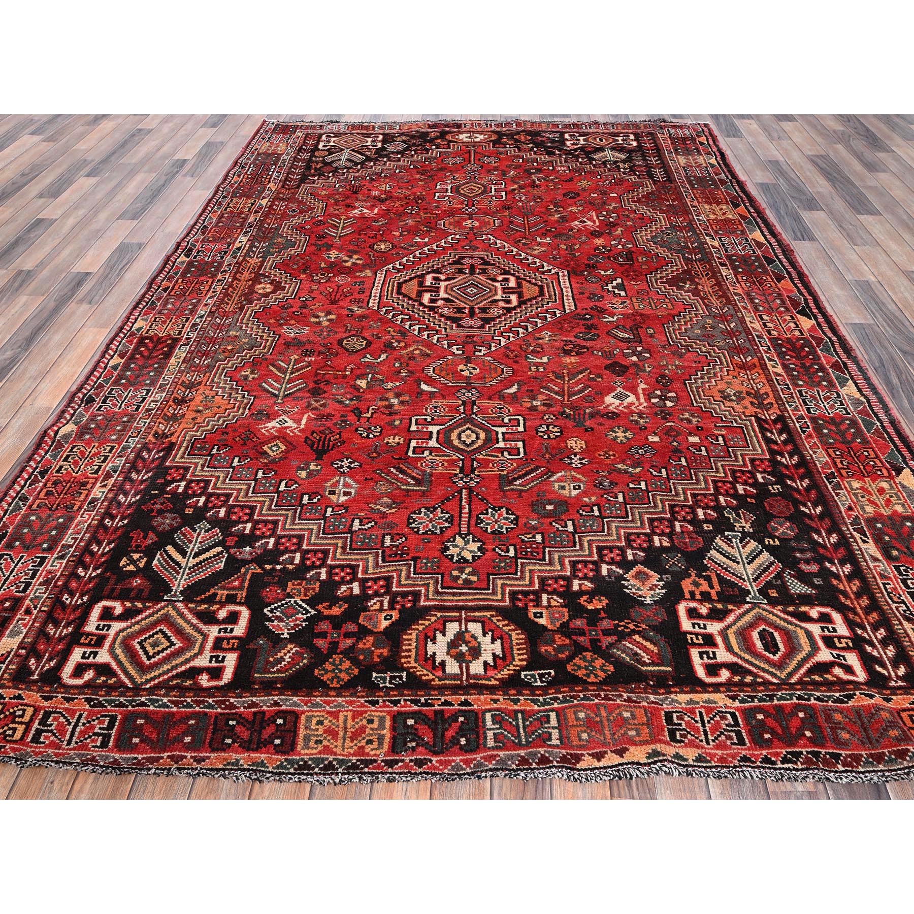 7'x9'10" Scarlet Red, Vintage Persian Shiraz with Geometric Medallion, Small Animal Figurines, Worn and Distressed, Shaved Low, Zero Pile, Sides and Ends Professionally Secured, Hand Knotted, 100% Wool, Oriental Rug Sh1014