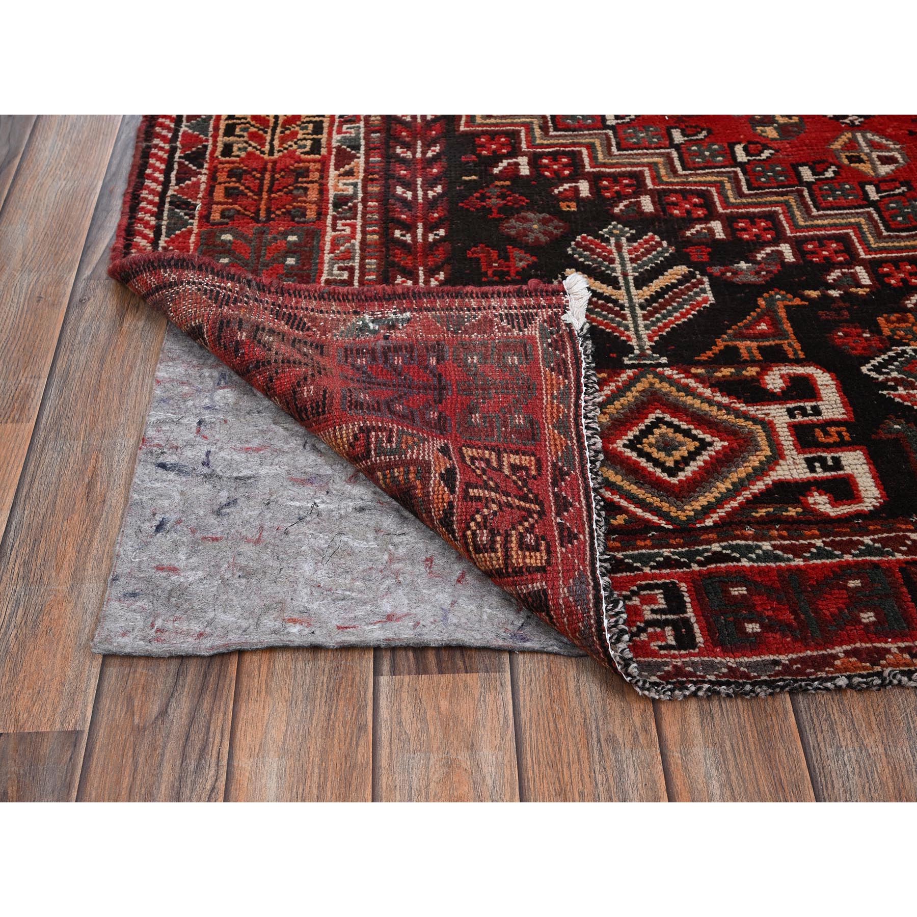 7'x9'10" Scarlet Red, Vintage Persian Shiraz with Geometric Medallion, Small Animal Figurines, Worn and Distressed, Shaved Low, Zero Pile, Sides and Ends Professionally Secured, Hand Knotted, 100% Wool, Oriental Rug Sh1014