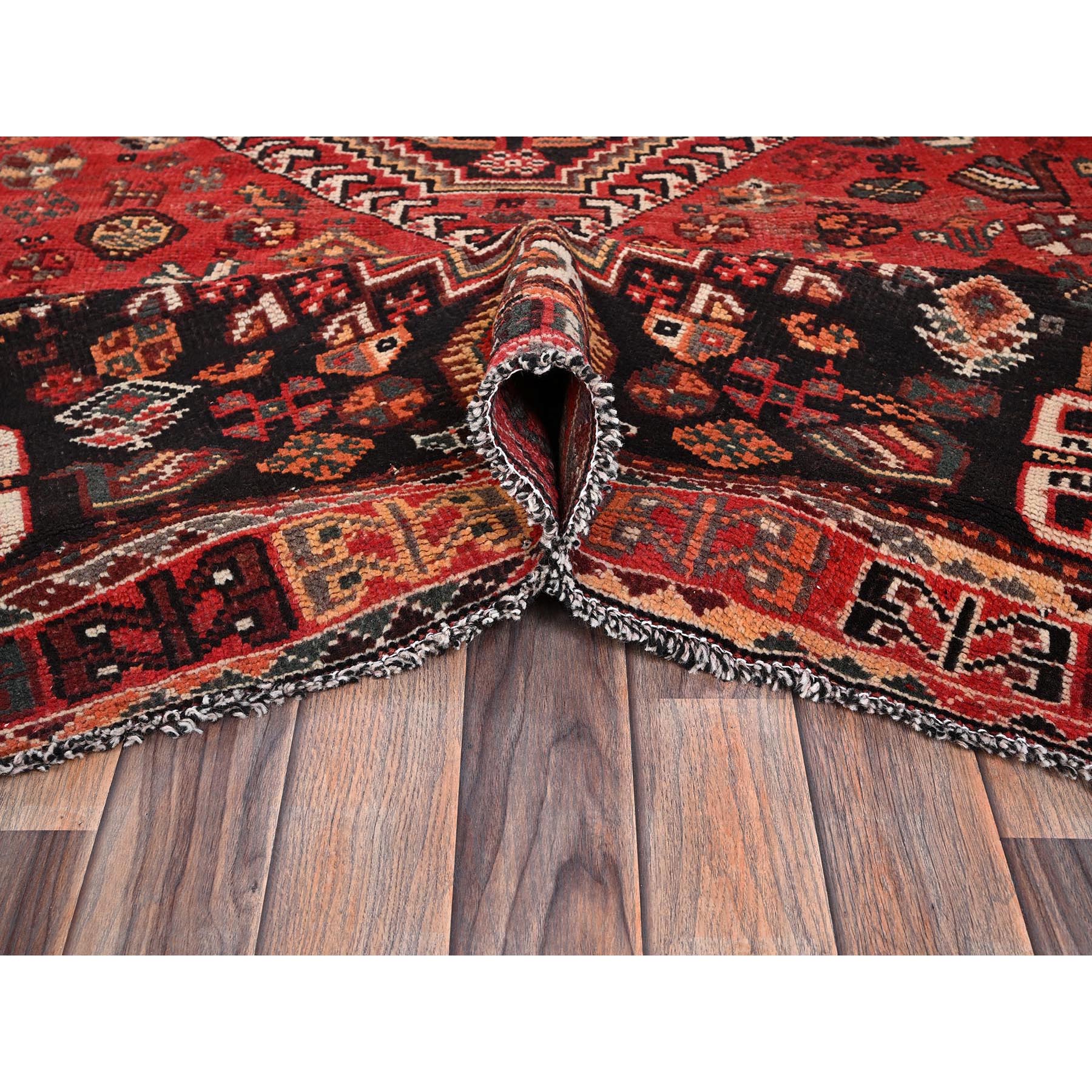 7'x9'10" Scarlet Red, Vintage Persian Shiraz with Geometric Medallion, Small Animal Figurines, Worn and Distressed, Shaved Low, Zero Pile, Sides and Ends Professionally Secured, Hand Knotted, 100% Wool, Oriental Rug Sh1014