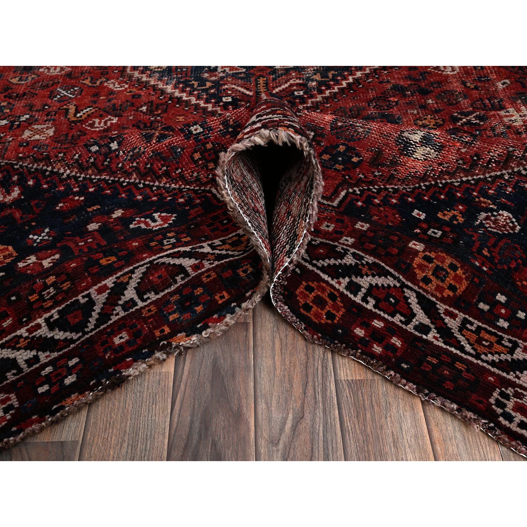 6'4"x9' Carmine Red, Vintage Persian Shiraz with Geometric Medallion, Small Animal Figurines, Worn and Distressed, Shaved Low, Zero Pile, Sides and Ends Professionally Secured, Hand Knotted, 100% Wool, Oriental Rug Sh1017