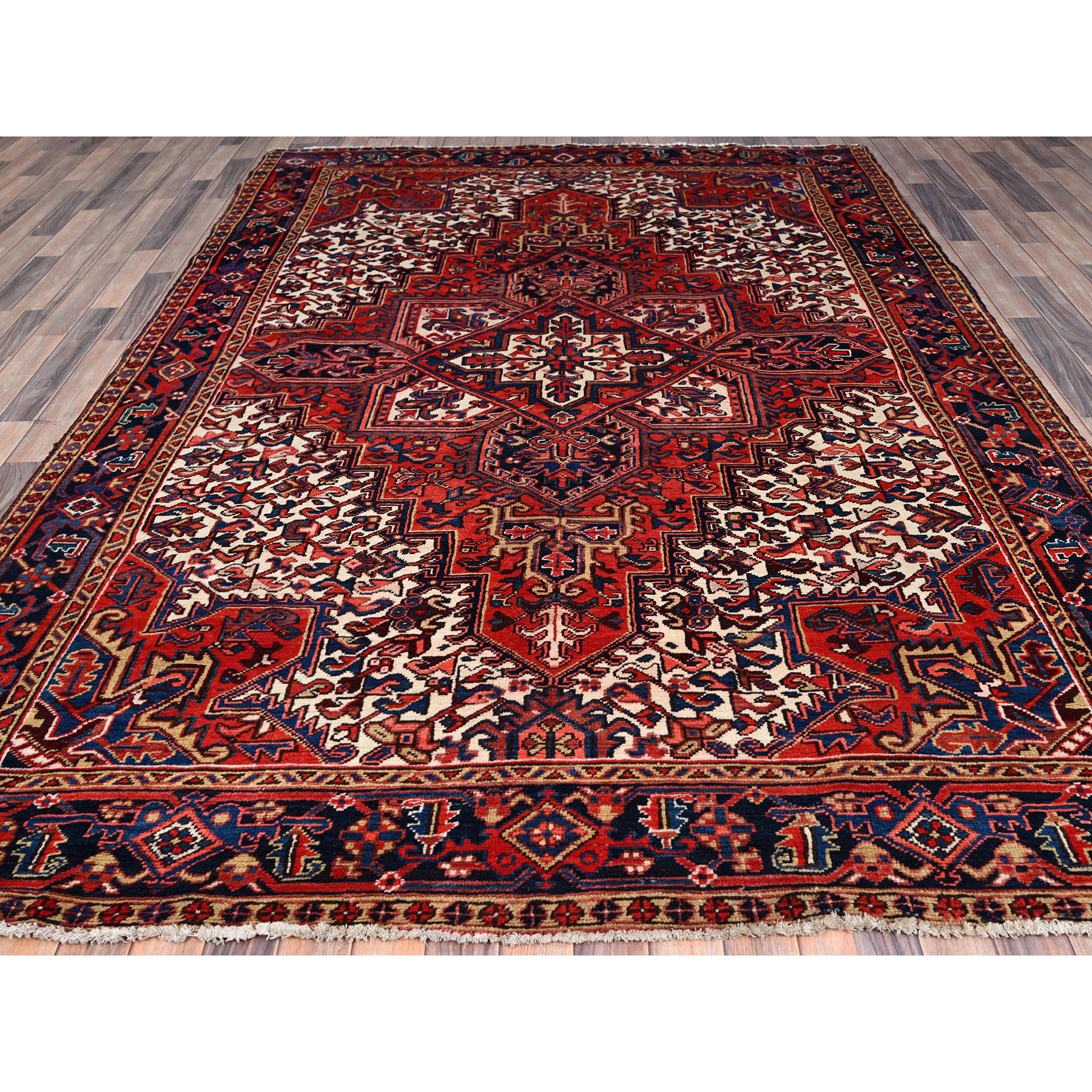 7'4"x10'2" Coquelicot Red, Hand Knotted Rustic Feel Evenly Worn Wool, Good condition, Clean, Abrash, Sides and Ends Professionally Secured, Shaved Down Vintage and Semi Antique Oriental Persian Heriz With Village Motifs Rug Sh85914